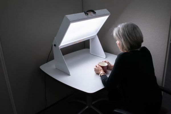 Woman with Coffee at Desk with SunRay II
