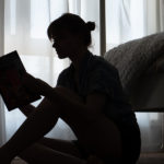 woman reading SAD book